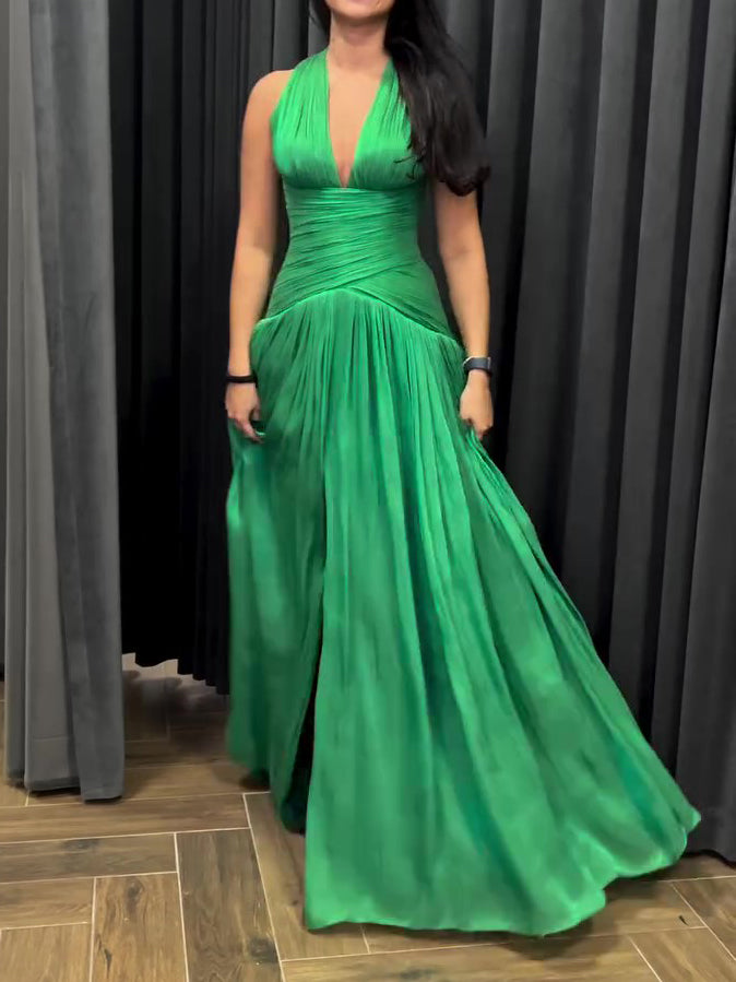 Emerald Green Plunging Neckline Gown With Pleated Skirt And Side Slit